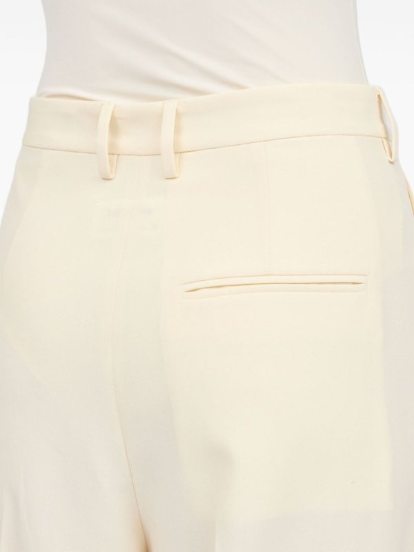 MM6 MAISON MARGIELA buy online Pantaloni Con Chiusura Decentrata