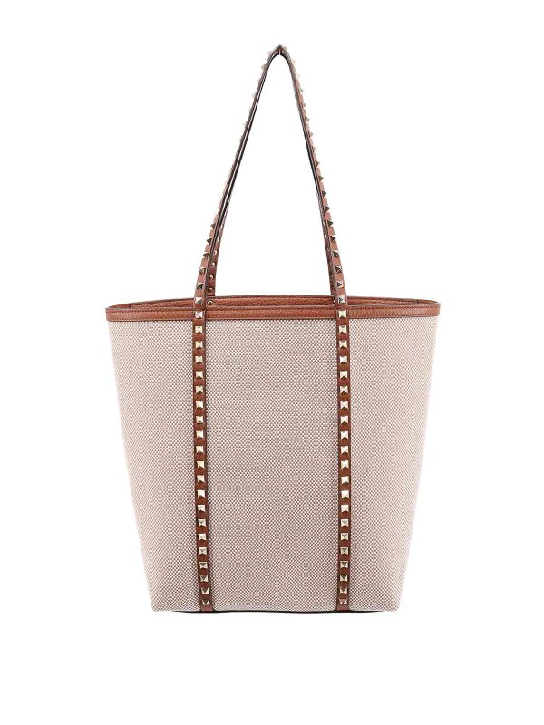 VALENTINO GARAVANI: clutches - Brown bags