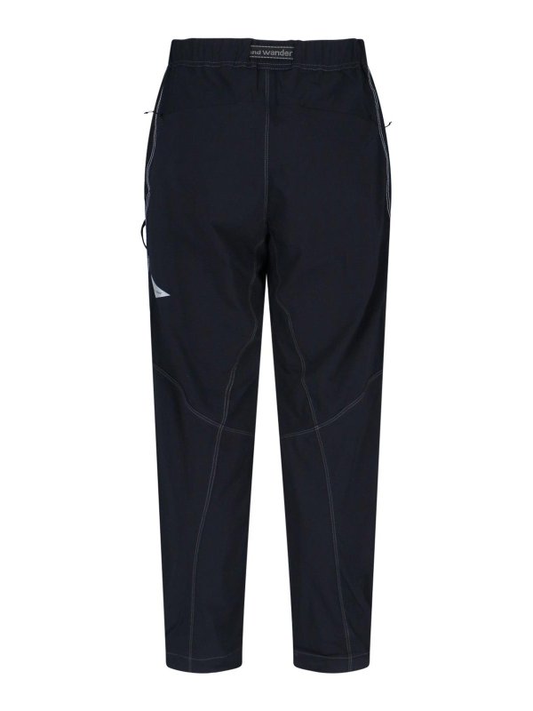 AND WANDER: スウェットパンツ online - トラックスーツ ボトムス - 黒