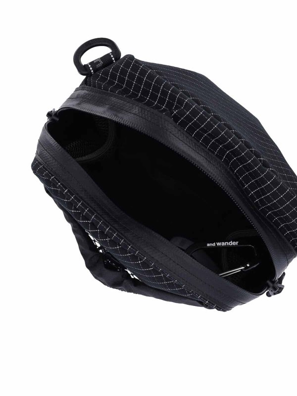クラッチバッグ - 黒 shop online: AND WANDER