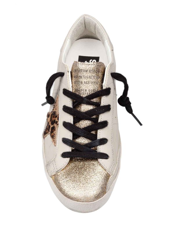 The Best Shops GOLDEN GOOSE: trainers - Super star sneakers in glitter gold