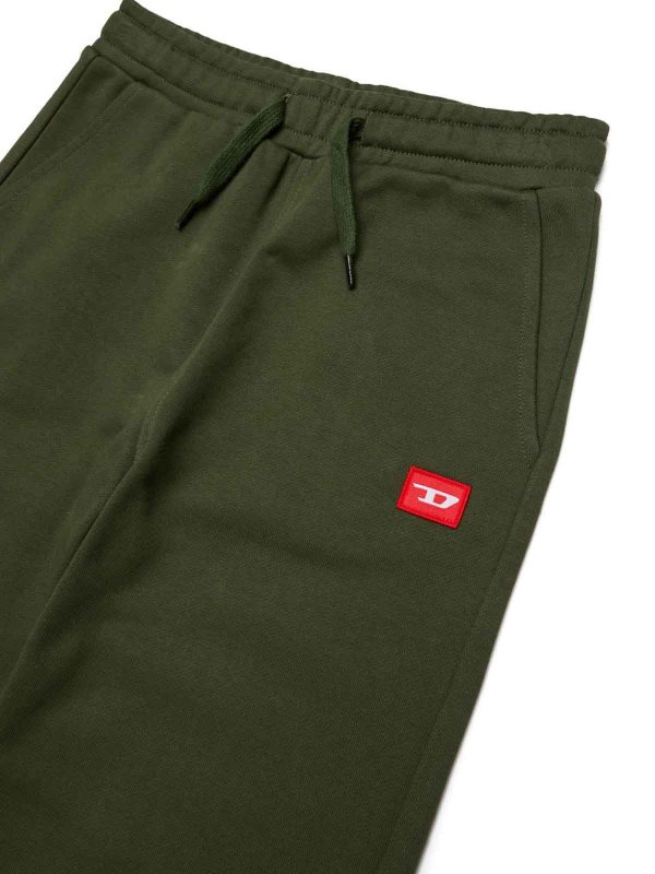 DIESEL: pantaloni sport online - Pantaloni della tuta in cotone verde scuro