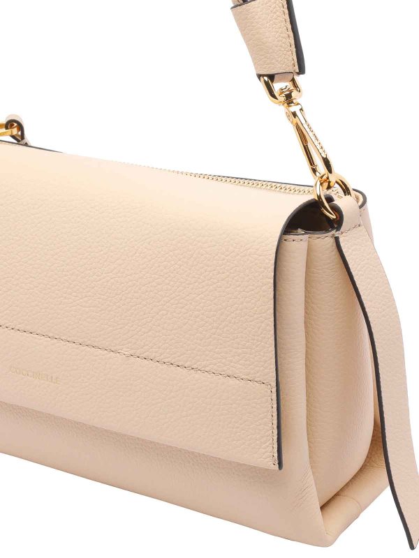 クロスボディバッグ - ベージュ shop online: COCCINELLE