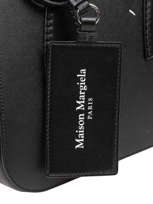 Hand bag in black leather shop online: Maison Margiela