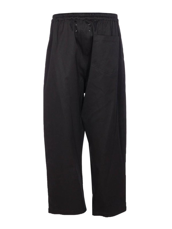 Maison Margiela: pantaloni sport online - Pantaloni da pista nera