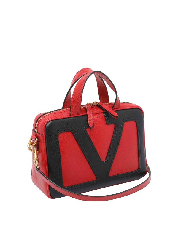 VALENTINO GARAVANI: クラッチバッグ online - クラッチバッグ - 赤