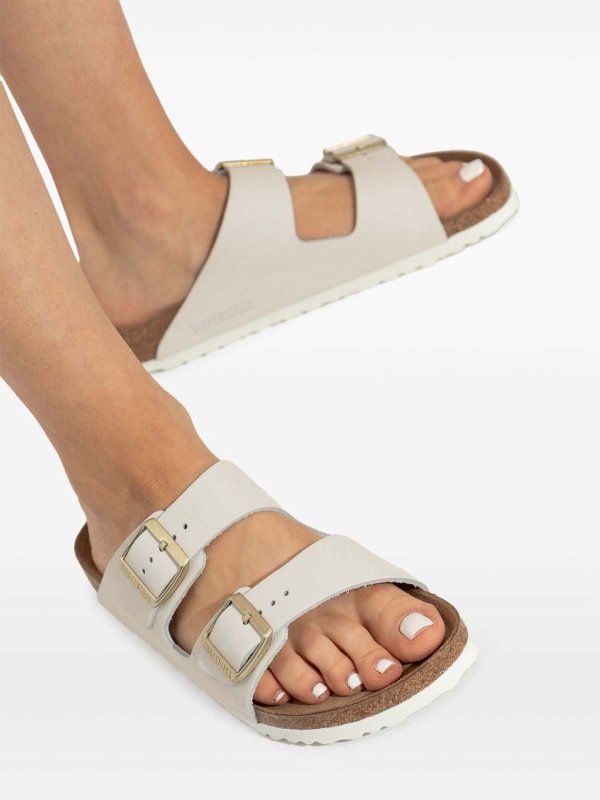 Arizona Double-Strap Sandals In Off-White By shop online: BIRKENSTOCK