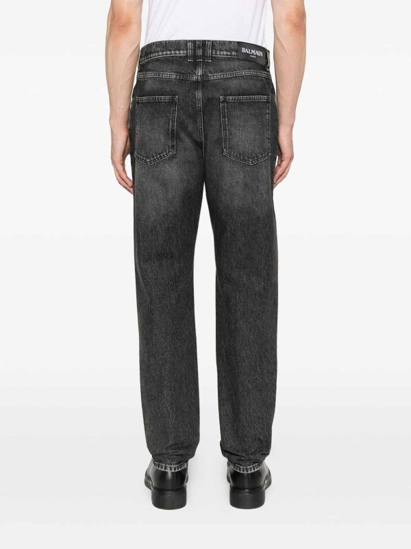 Jeans with logo application shop online: Balmain