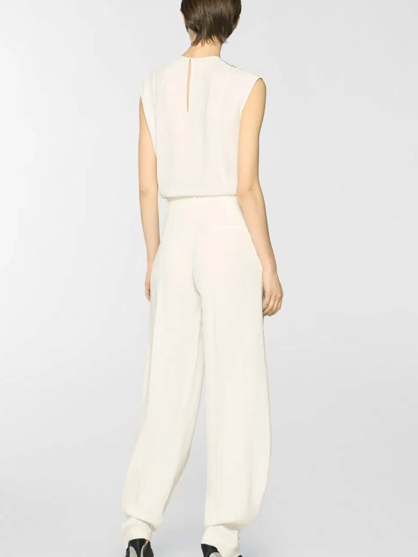 The Best Shops GENNY: Suéteres con cuello pico - Suéter Cuello Redondo - Beis