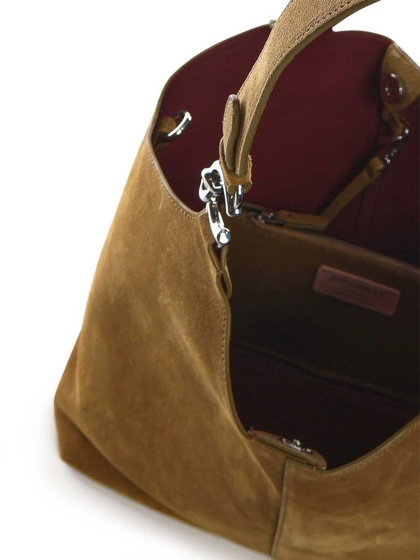 クラッチバッグ - ピンク shop online: COCCINELLE