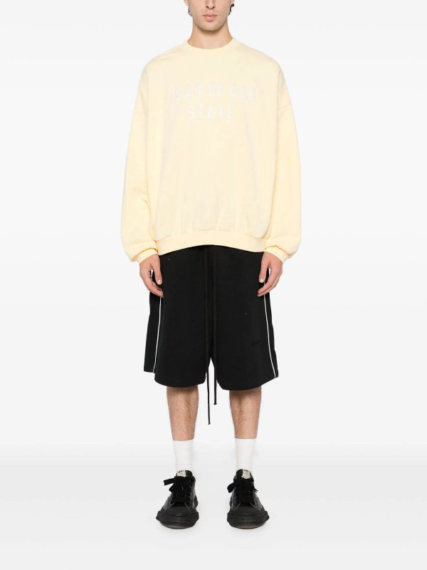 FEAR OF GOD: maglia collo rotondo online - Maglione con applicazione logo