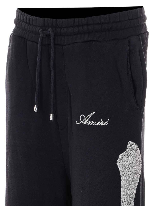 トラックスーツ ボトムス - 黒 Replica 
online: AMIRI