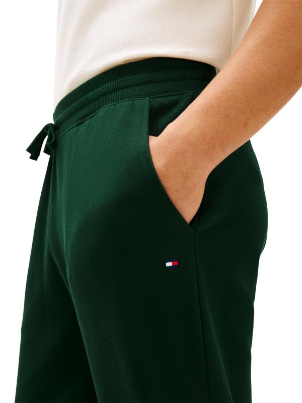 The Best Shops TOMMY HILFIGER: スウェットパンツ - トラックスーツ ボトムス - 緑
