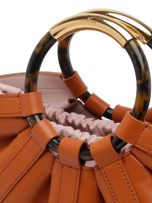 Crab Shell Handbag Replica 
online: COCCINELLE