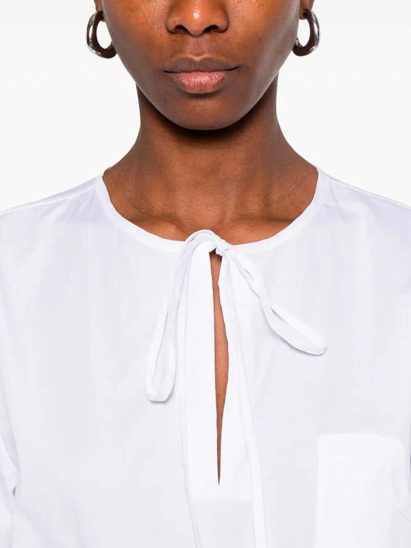 Camicia Con Colletto A Nastro Replica 
online: CUANTICO