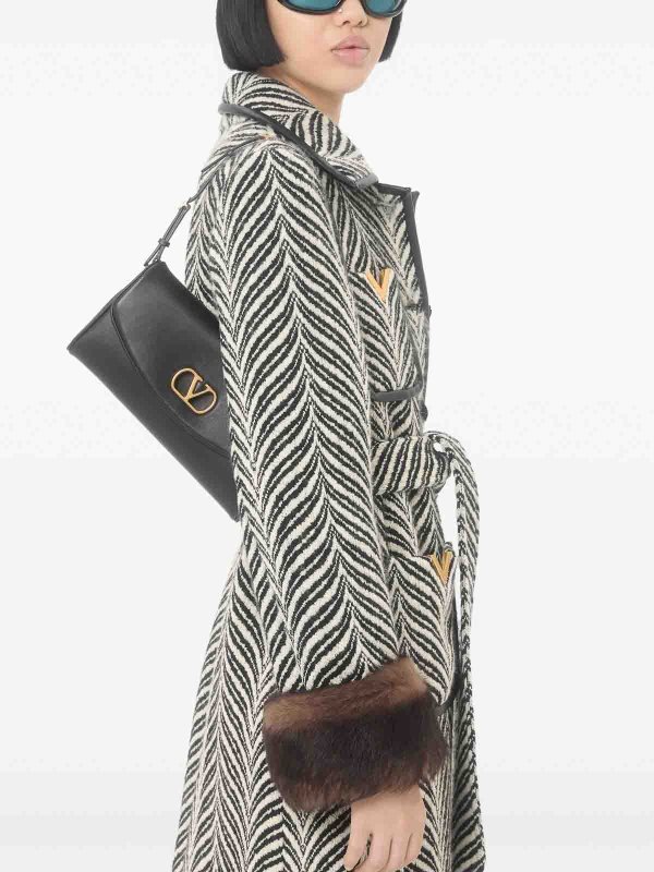 VALENTINO GARAVANI: クラッチバッグ online - クラッチバッグ - 黒
