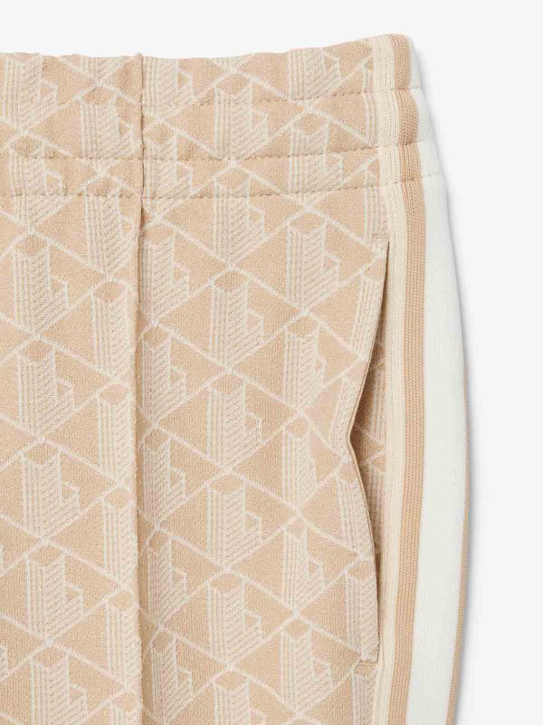 LACOSTE: casual trousers online - Monogrammed flared sweatpants