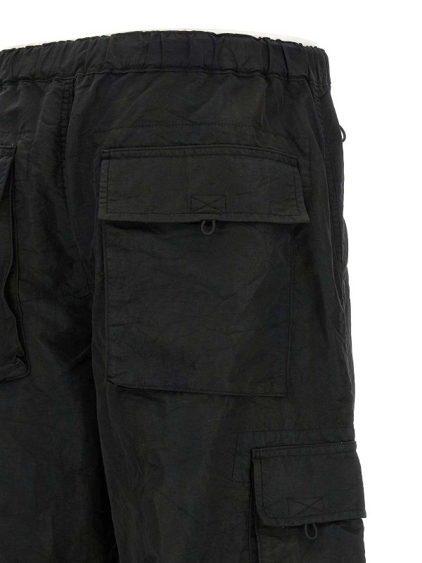 カジュアルパンツ - 黒 shop online: COMME DES GARÇONS HOMMES PLUS