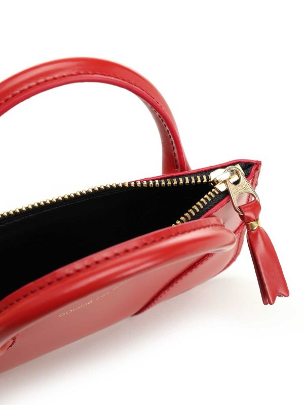 財布 - 赤 shop online: COMME DES GARCONS
