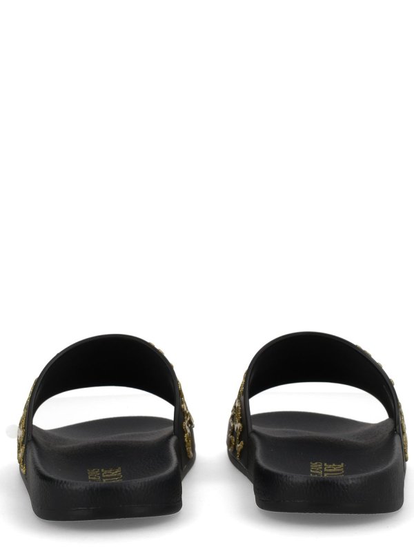 フラットシューズ - 黒 shop online: VERSACE JEANS