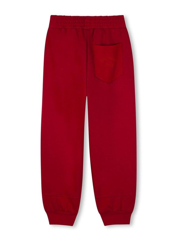 GIVENCHY: スウェットパンツ online - トラックスーツ ボトムス - 赤