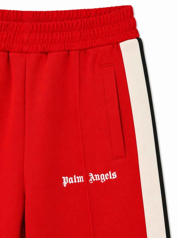 The Best Shops Palm Angels: カジュアルトラウザー - カジュアルパンツ - 赤