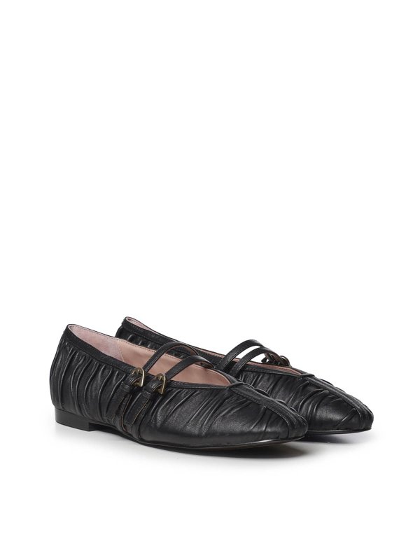 フラットシューズ - 黒 shop online: COCCINELLE