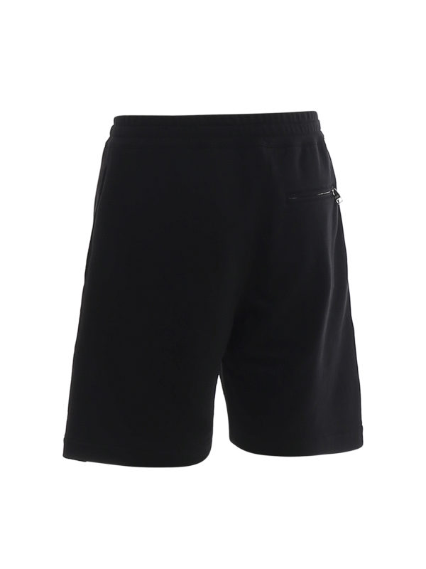 ALEXANDER MCQUEEN: pantaloni sport online - Pantaloni corti con patch dragone