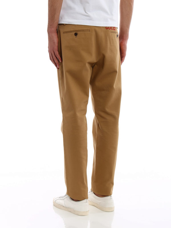 Beige cotton drill chino trousers shop online: GUCCI