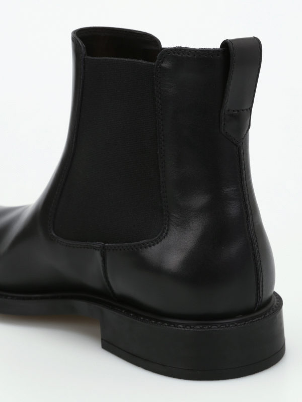 Black leather slip-on booties shop online: TOD