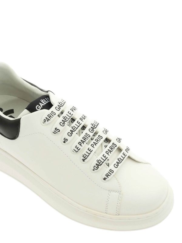 Sneakers con lacci logati bianche e nere shop online: Gaelle Paris