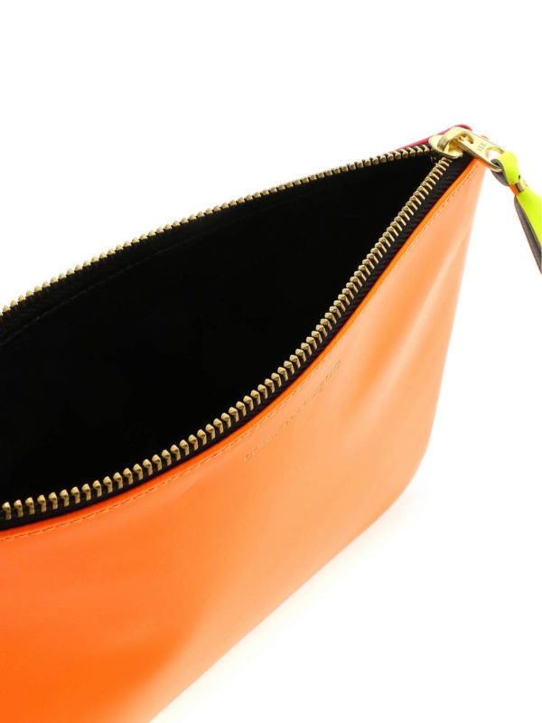 COMME DES GARÇONS WALLET buy online Super Fluo pouch in orange and pink