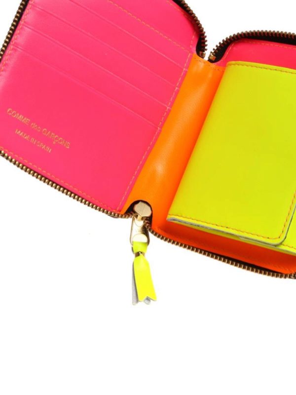 Comme des garcons store wallet neon