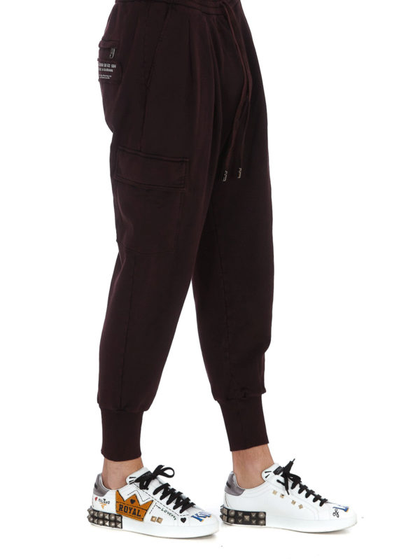 DOLCE & GABBANA: スウェットパンツ online - トラックスーツ ボトムス - ボルドー