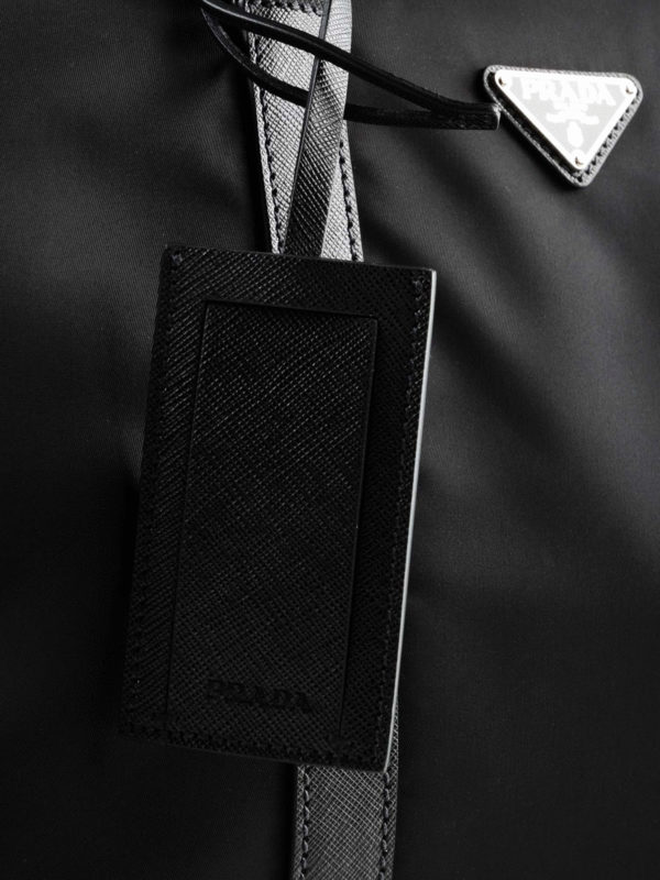 Fabric travel duffle bag with leather details shop online: PRADA