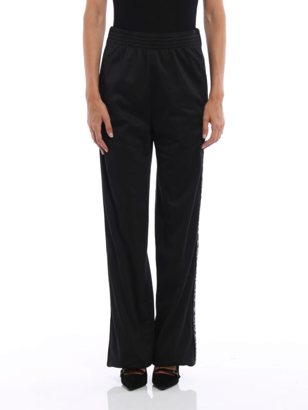 GIVENCHY: tracksuit bottoms online - Logo detailed jogging pants