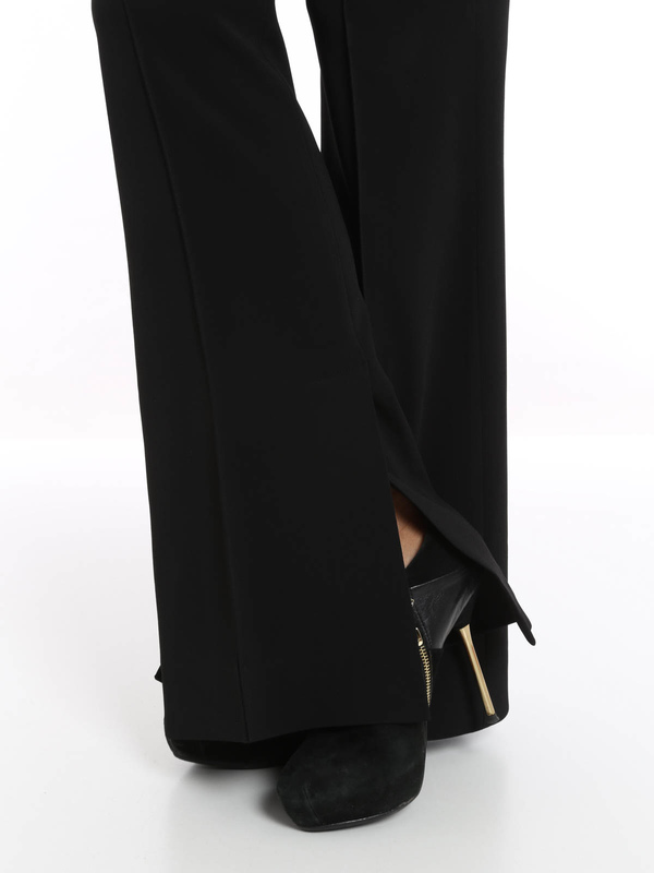 Pantalone con zip dorata