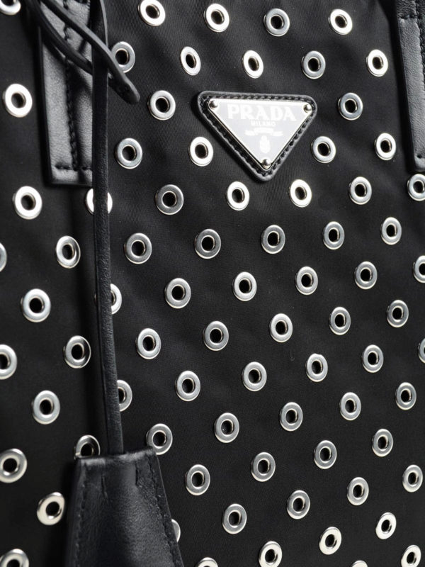 Grommet leather bag shop online: PRADA