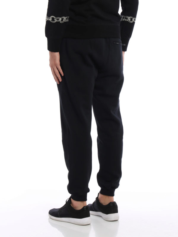 iKRIX ALEXANDER MCQUEEN: tracksuit bottoms - Embroidered rose tracksuit bottoms
