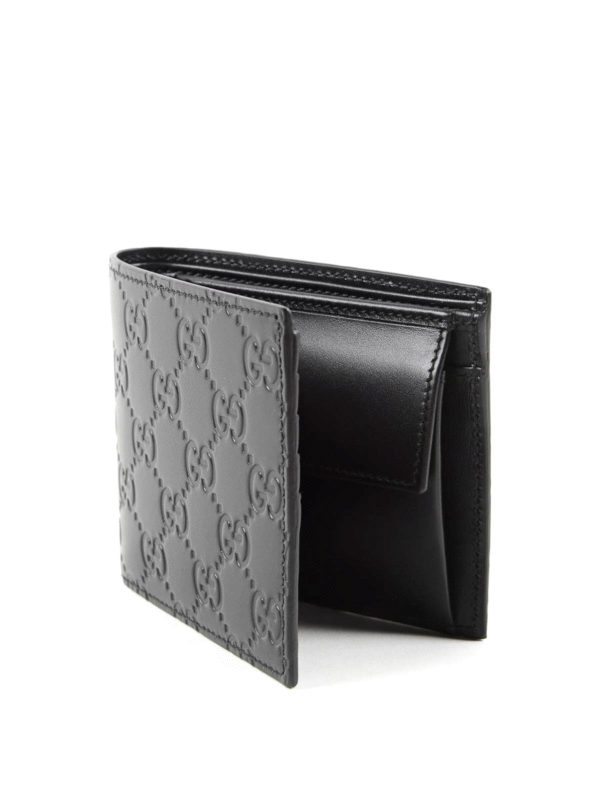 GG Embossed Leather Wallet in Black - Gucci