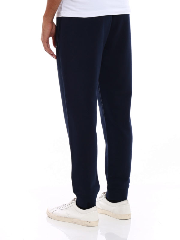 iKRIX MCQ: tracksuit bottoms - Swallow patch blue sweatpants