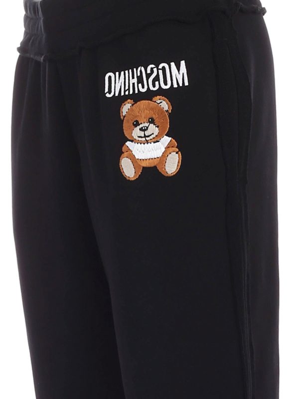 iKRIX MOSCHINO: スウェットパンツ - トラックスーツ ボトムス - 黒