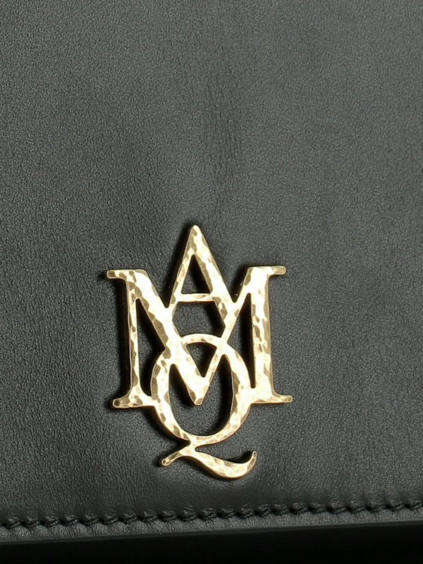 Monogram leather clutch shop online: ALEXANDER MCQUEEN