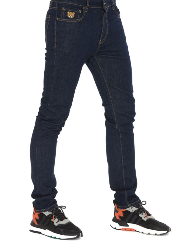 MOSCHINO: straight leg jeans online - Teddy Bear patch denim jeans