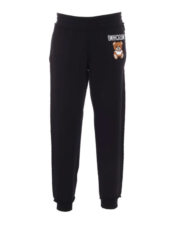 MOSCHINO: スウェットパンツ - トラックスーツ ボトムス - 黒