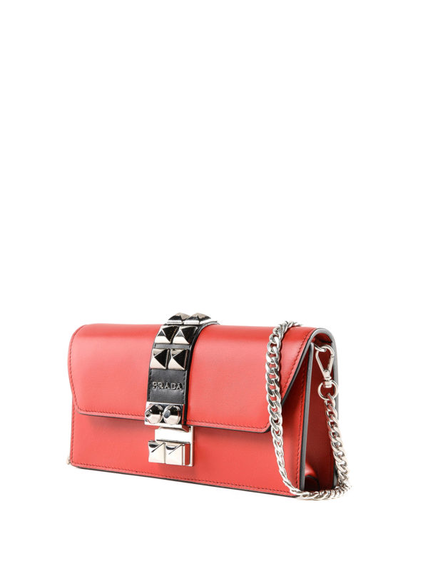 PRADA: clutches online - Studded leather clutch with chain strap