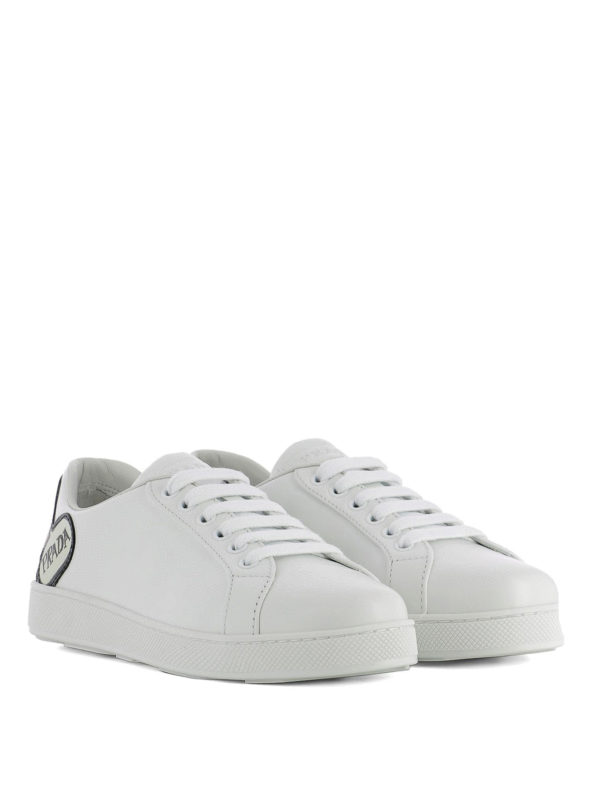 PRADA: trainers online - Comic strip patch leather sneakers