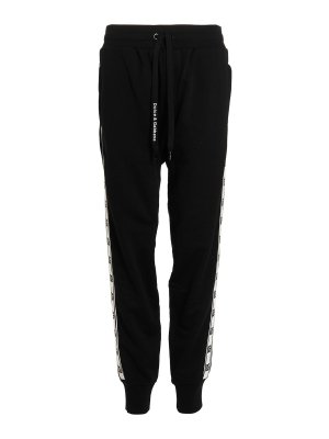 DOLCE & GABBANA: pantaloni sport - Joggers con bande logo