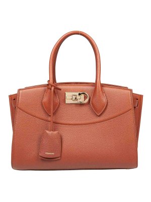 SALVATORE FERRAGAMO: totes bags - Hand bag in pounding leather cognac color