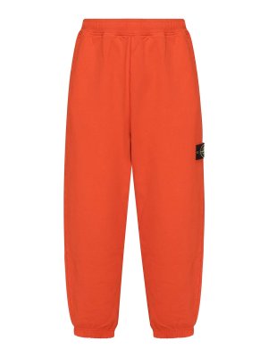STONE ISLAND: Pantalones deportivos - Pantalones Deportivos - Naranja